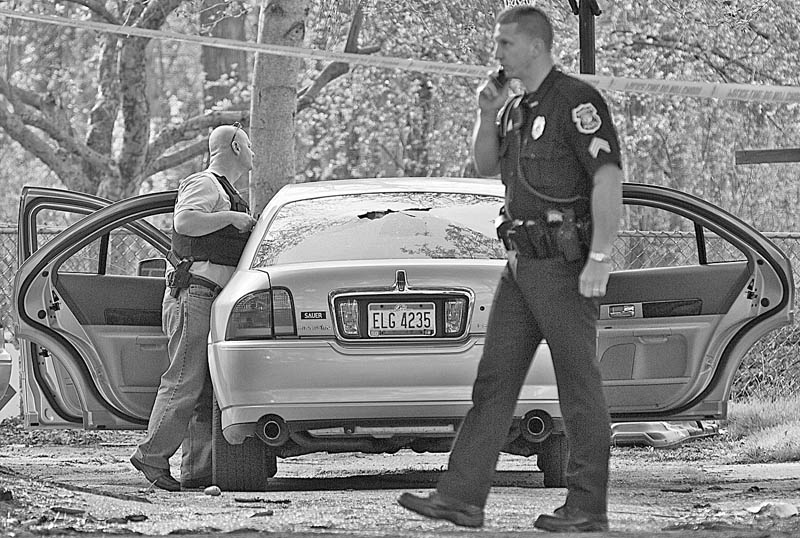 Boardman police and U.S. marshals respond to a Wednesday afternoon shooting on Mill Creek Boulevard. The victim suffered multiple gunshots, but the man was still talking when he was taken to St. Elizabeth Health Center. Police were doing a house-to-house canvass as their investigation got under way.