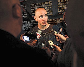 WBC/WBO middleweight champion Kelly Pavlik speaks to the media at a news conference in New York, Wednesday, April 14, 2010. Pavlik was there to promote his fight against WBC super welterweight champion Sergio Martinez on Saturday, Apr. 17, 2010. (AP Photo/Seth Wenig)