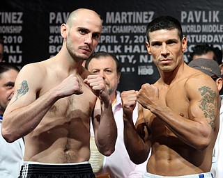 Kelly Pavlik of Youngstown, OhIO, left, and Sergio Martinez of Argentina pose after their weigh-in for a WBC middleweight championship fight, Friday, April 16, 2010, in Atlantic City, N.J. (AP Photo/Sean M. Fitzgerald)