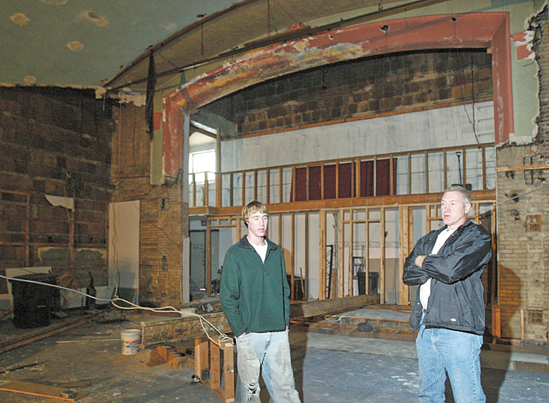 Don Elzer, right, is renovating a former movie theater in East Palestine for use as a community theater. He and his son Dan Elzer, left, are shown in the theater. They are part of the East Palestine Community Theater group,
which tentatively plans to open the theater early next month. After opening with “South Pacific” and “The Wizard of Oz” this spring and summer, the group plans a full season of productions in 2010-11.
