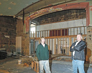 Don Elzer, right, is renovating a former movie theater in East Palestine for use as a community theater. He and his son Dan Elzer, left, are shown in the theater. They are part of the East Palestine Community Theater group,
which tentatively plans to open the theater early next month. After opening with “South Pacific” and “The Wizard of Oz” this spring and summer, the group plans a full season of productions in 2010-11.