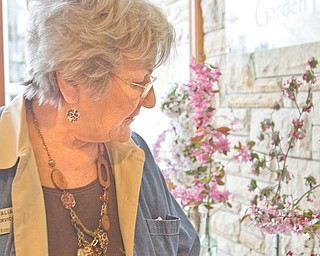 Beverly Italiano, volunteer coordinator and receptionist for Fellows Riverside Gardens, discusses the types of horticulture entries in Saturday and Sunday’s spring flower show.