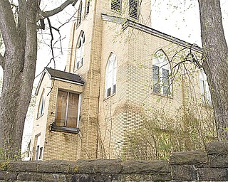 The side of the former St. Mary’s Byzantine Church at Florence Avenue and Salt Springs Road on Youngstown’s West Side. A local man is behind the Sacred Places Dialogue. The concept is based on a nationwide grass-roots movement on how to preserve sacred sites that once served as houses of worship and gathering places for ethnic groups.