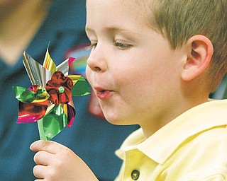 Samuel McPherson, 3, son of Paul and Amy McPherson of Boardman, attended the fifth annual Pinwheels for Prevention at Akron Children’s Hospital Beeghly Campus in Boardman. Samuel’s brother, Maxwell, of Cub Scout Pack 89, led the Pledge of Allegiance to start Thursday’s event.