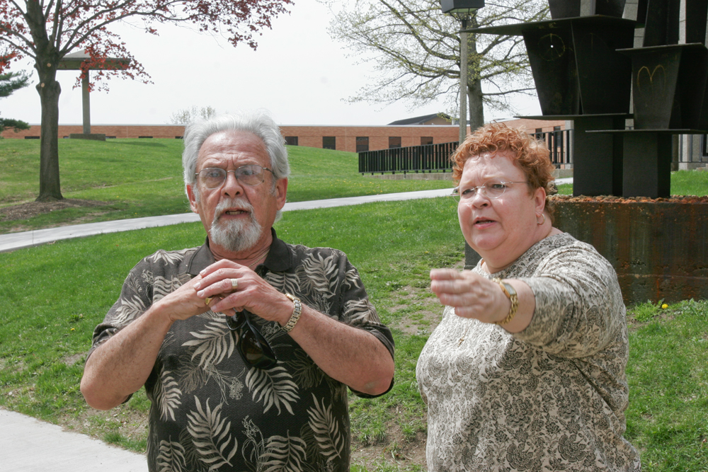 Harvey Kayne, a Valley resident who was a graduate student at Kent State on May 4, 1970 when 4 students were killed by Ohio National Guard gunfire, stands near the site on the Kent campus. At right is Jane Doughton who was student at Kent at the time.