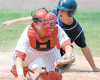 Butler’s Andrew Eckhardt (2) comes into home plate to score as Youngstown State catcher Jonathan Crist (4) misplays the ball on a throw during a game Sunday at Eastwood Field. The teams played a twinbill, with the Bulldogs winning the first game, 9-8, and the Penguins taking the second, 10-6.