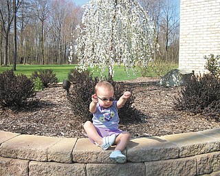 Isabella LaMont was enjoying a warm spring day over Easter weekend at the home of her grandparents, Ron and Cindy Perry of Lowellville. She is the daughter of Ronda and Keith LaMont of Parma Heights.