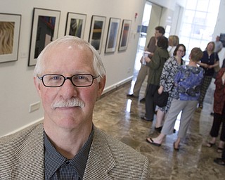 LISA-ANN ISHIHARA | THE VINDICATOR ..Michael Cole poses in front of his exhibit "Outside/In: Photographs" exhibit at The Butler Institute of American Art, Sunday, May 2, 2010