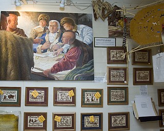 LISA-ANN ISHIHARA | THE VINDICATOR
A Joseph Donnelly original painting entitled "Moses Cleaveland's Pre-Treaty Deliberations with Chief Red Jacket & the Mohawk Delegation for the Western Reserve of Connecticut in Ohio, 1796" is for sale alongside carved block prints and other various artwork..Mohawk Valley Fine Arts located on the northwest corner of Route 224 and Route 534 in Berlin Center is the personal studio of artist Joseph Donnelly.