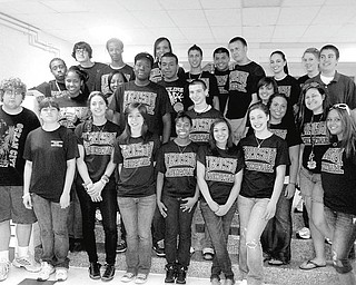A spaghetti dinner April 25 was a benefit for Jordan Dubose, a cancer patient who is undergoing chemotherapy. Dubose, a junior at Ursuline High School, is an honor student, a member of the National Honor Society, the Beta Club and the basketball team. Admistrators, faculty, parents and the Ursuline High School students above served 600 pasta dinners at the event and also conducted a benefit Chinese auction. Contributions for Dubose and his family can be sent to St. Joseph the Provider School or to Huntington Bank.