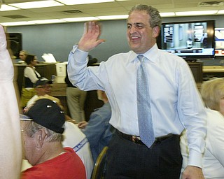 William D Lewis The Vindicator David Betras Mahoning Dem Chairman high 5s during tuesday party.Plaza