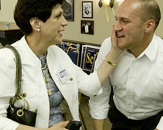 William D Lewis The Vindicator Carol rimedio righetti and Joe Schiavoni await returns at Mahoning Conty Dems party in Mahoning Plaza Youngstown.