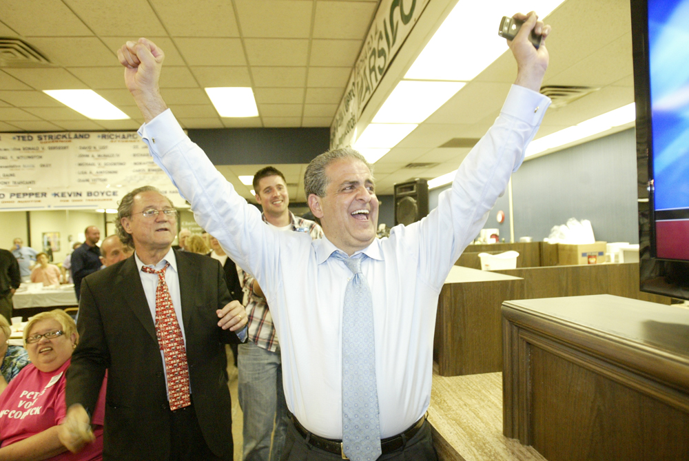 William D LewisThe Vindicator Bob Hagan and Dave Betras celebrate Victory party at Mahoning Plaza Tuesday.