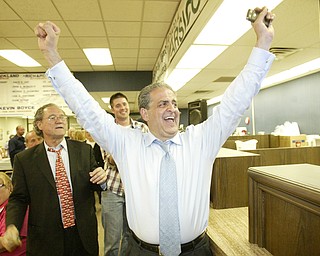 William D LewisThe Vindicator Bob Hagan and Dave Betras celebrate Victory party at Mahoning Plaza Tuesday.