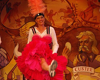 The winner of the contest is Heather Costantino, who obviously goes to great lengths to have fun. In this prize-winning picture, she was hamming it up during a dinner show at Disney World.
Heather and her husband, Carmen, and their daughter, Megan, live in Austintown. For her great sense of humor, Heather received a $100 gift certificate for dinner at Bruno’s, U.S. Route 224, Boardman. Congratulations!