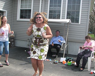 Michele Audia of Edinburg, Pa., is having fun with her kids and family.