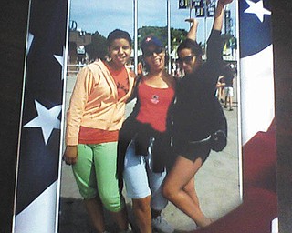 Santa Cruz of Boardman is hamming it up with her daughters, Alexia M. Santiago and Jaclyn C. Williams, at Cedar Point.