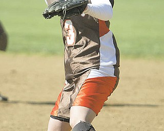East Palestine freshman ace Karly Pence delivers a pitch and a three-hit shutout against the Springfield Tigers on Monday.