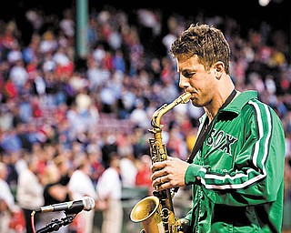 Liberty High graduate Jerry DePizzo of the rock band O.A.R. plays the national anthem before a Boston Red Sox game in 2008. FOX Sports is using O.A.R.’s “This Town” for its Major League Baseball promotions nationwide.