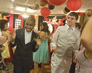 LISA-ANN ISHIHARA | THE VINDICATOR...Leon Brown and John Michael Snitzer of Campbell Memorial dance at the annual tri county special needs prom, held at Anthone's.