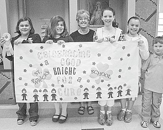 Students from St. Patrick School in Hubbard participated in the American Cancer Society Relay For Life at Youngstown State University. The funds they collected for the event and from students taking part in a dress-down day at school were donated to the ACS. Those forming Team Ealy and raising $1,797.04 for the cause included, from left, Camryn Ealy; Lily Mild; Mrs. Elaine Scott, first-grade teacher; Ainsley McDonald-Boyer, Sierra Lehman: and Aidan Ealy, a kindergarten student. Team members participating but not pictured are Megan Scutillo, Charity Unruh and Roberta Robinson.