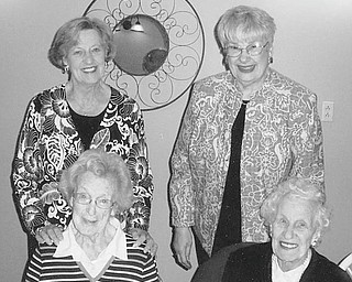 Mu Chapter of Delta Kappa Gamma Society International met April 19 at Donavito’s Italian Grille in Struthers to honor members who joined the sorority during the 1950s and 1960s. Four of the honorees attending the meeting are, seated from left, Mary B. Smith (1963) and Frances Ritz (1964), and, standing from left, Ruth Stevenson (1955) and Leslie Kiske (1964). They shared memories of past meetings, and each received a pot of tea roses. Honored in absentia were Helen Day (1959), Ruth Forsythe (1963), Margaret Remias (1964), Lillian Jacobs (1965), Betty Miller (1957) and Bessie Veck (1966).