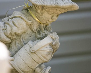 ROBERT K. YOSAY | THE VINDICATOR..Not just ornaments - but a dutch boy water fountain - at Farmer Dave's Gift and Garden Shoppe in North Lima -- 30-