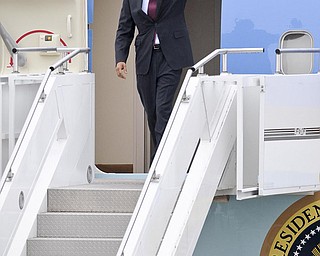 President Obama gets off Air Force One at Youngstown/Warren Regional Airport before heading to V&M Star in Youngstown.