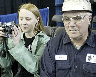 William D Lewis| The Vindicator Melissa Takasand her father Phil Willich,of Poland and  both employees of V& M Star Stelel take in the visit of President Obama  5-18-10.