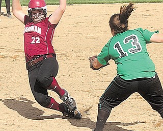 SOFTBALL - (22) Brooke Meenachan of Boardman tries to beat the tag of (13)  Jo Bondra during their game Wednesday afternoon in Boardman.