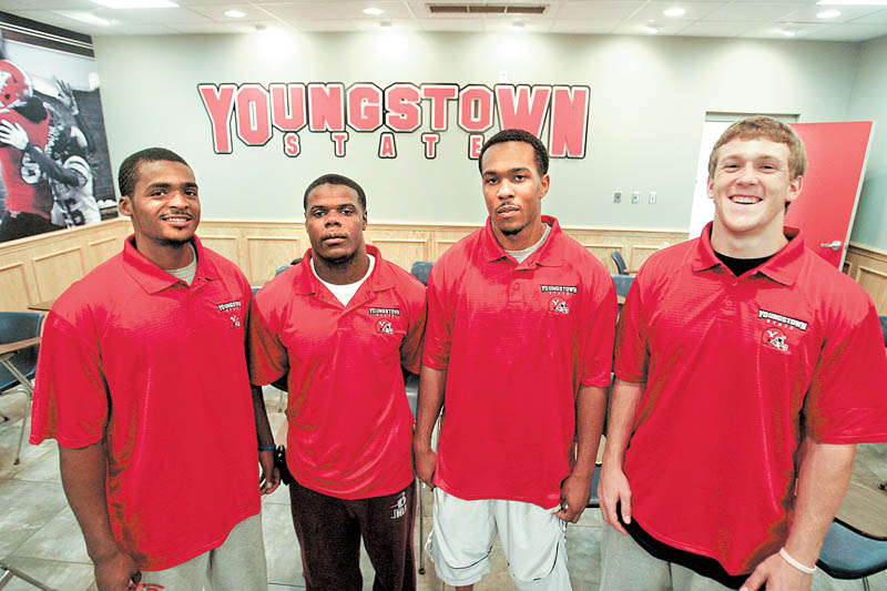 Youngstown State’s four newest football recruits, from left, Grant Mayes  Adaris Bellamy, Julian Harrell and Will Shaw, said on Wednesday that the new coaching staff and the school’s facilities played the biggest factors in their joining the team.
