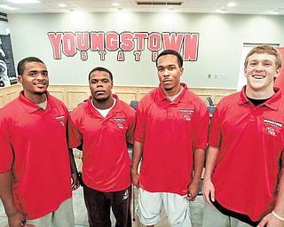 Youngstown State’s four newest football recruits, from left, Grant Mayes  Adaris Bellamy, Julian Harrell and Will Shaw, said on Wednesday that the new coaching staff and the school’s facilities played the biggest factors in their joining the team.