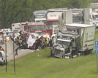 This fatal accident closed the eastbound lanes of Interstate 80 for several hours Monday. Three people in a sport-utility vehicle were killed afternoon when their vehicle was hit from behind by a tractor-trailer as traffic was slowing down for roadwork. The crash pinned the SUV between the truck and another tractor-trailer in front of it in Hubbard Township.