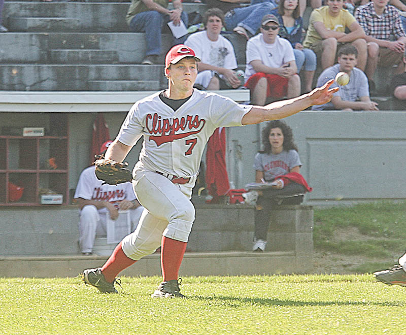 Columbiana pitcher Hank Schlueter fires a throw to fi rst base after fielding a bunt attempt during a recent game. The Clippers will play Buckeye Central in a Division IV regional baseball game on Thursday.