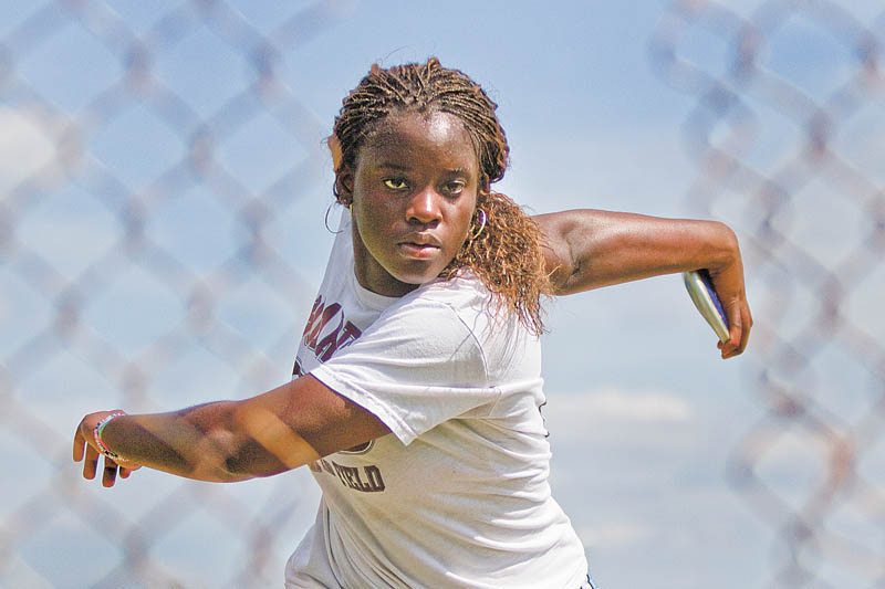 Boardman senior Valerie Hood practices throwing the discus at Boardman Stadium on Tuesday. Hood will compete in the Division I regional track and field meet starting today.