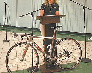 Erin Quinlan of Carbon Racing discusses the 2010 Tour of the Valley bicycle race during a press conference Thursday in downtown Youngstown. The event is scheduled July 9-11.