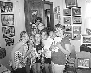 Third-graders from Roosevelt Elementary School in Hubbard pause during their tour of the Hubbard Historical Society’s McBride House on Hager Street. Members of the society recently gave 150 students the tour. Group tours of McBride House are regularly scheduled for the second Sunday of the month, but also can be scheduled at other times. To set up a tour, call Cecilia Cooper at 330-534-4247.