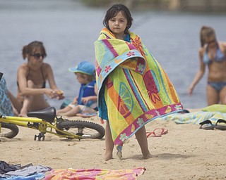 LISA-ANN ISHIHARA | THE VINDICATOR..Lilly Fultz (5) of Parma wraps up in a towel after swimming during day one of Jonesfest at Nelson Ledges Quarry Park.