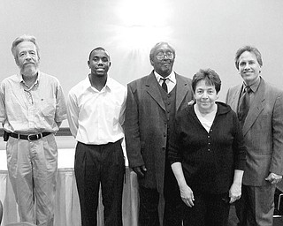 Receiving awards for their work with Youngstown Area Goodwill Industries at a banquet May 13 were, from left, John Ogarek, graduate of the year; Harlan Jones, supervisor of the year; Jerry Scott, employee of the year; Kathleen Dutko, graduate of the year; and Toby Mirto, president of the Goodwill board of trustees, who made the presentations.