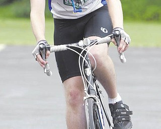 Kevin Cochran of Minneapolis, Minn., rides into Westminster Presbyterian Church, Boardman, as part of the 4K for Cancer, a group raising awareness for cancer.
