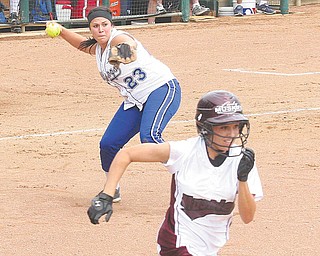 Poland's (23) Jenna Modic makes a play on a bunt attempt as (4)Regan Buchanan tries to beat the throw Thursday afternoon in Akron.