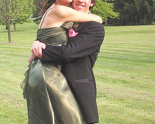 Patti Hall of Boardman sent this picture of her kids, Alison, who just graduated from Boardman High School, and Philip, who finished his junior year there. Before heading off to the prom with their dates, they honored MomÕs request for a few family pictures in Boardman Park.