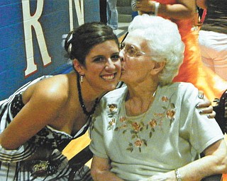 Kristin OÕConnell of Western Reserve High School in Berlin Center gets a kiss from her Grandma OÕConnell during the 2010 Promenade.