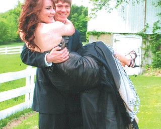 Aaron Hartsough, a Canfield High School senior, and Rachael Morris, a junior.