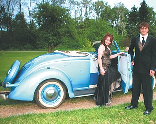 Aaron Hartsough and Rachael Morris are preparing to leave for the Canfield High School prom.