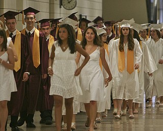 ROBERT K. YOSAY | THE VINDICATOR..here they come as the 2010 graduates head towards graduation as marshalls lead the class to the gym at Boardman High Schools Graduation 2010 held at the school -30