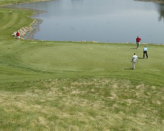 ROBERT K. YOSAY | THE VINDICATOR..Reserve Run course in Poland - Dick Logan ( blue ) Dan Polen ( red and Terry Shell ( stripes ) -30-