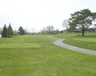 ROBERT K. YOSAY | THE VINDICATOR..The Lake Club course in Poland - Mike Ferante ( blue stripes) Jim Pipino ( solid blue and Derrick Naper -30-