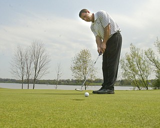 ROBERT K. YOSAY | THE VINDICATOR..The Lake Club course in Poland - Mike Ferante ( blue stripes) Jim Pipino ( solid blue and Derrick Naper -30-