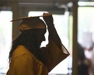 ROBERT K. YOSAY | THE VINDICATOR...Last minute check is Cori Pavlicko who also was one of the valedictorian's at Lowellville High School gym - the glass of 2010 - graduated Sunday afternoon-30